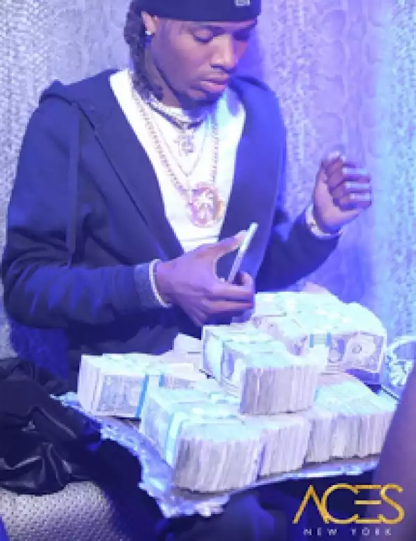 Fetty Wap with loads of cash at a strip club